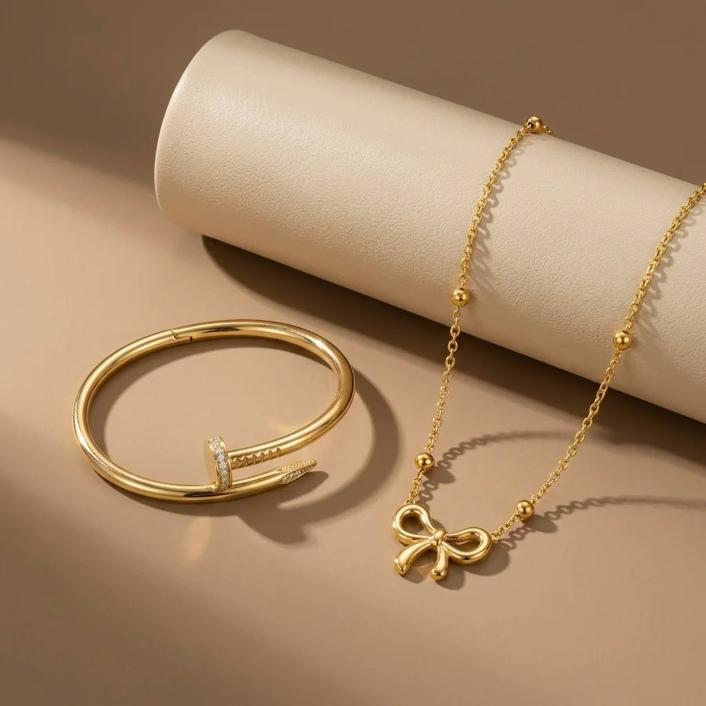 18Kt Gold Plated Bow Pendant Necklace & Bracelet Set