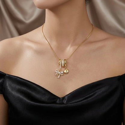 18Kt Gold Plated Bow & Sun Charm Pendant Necklace