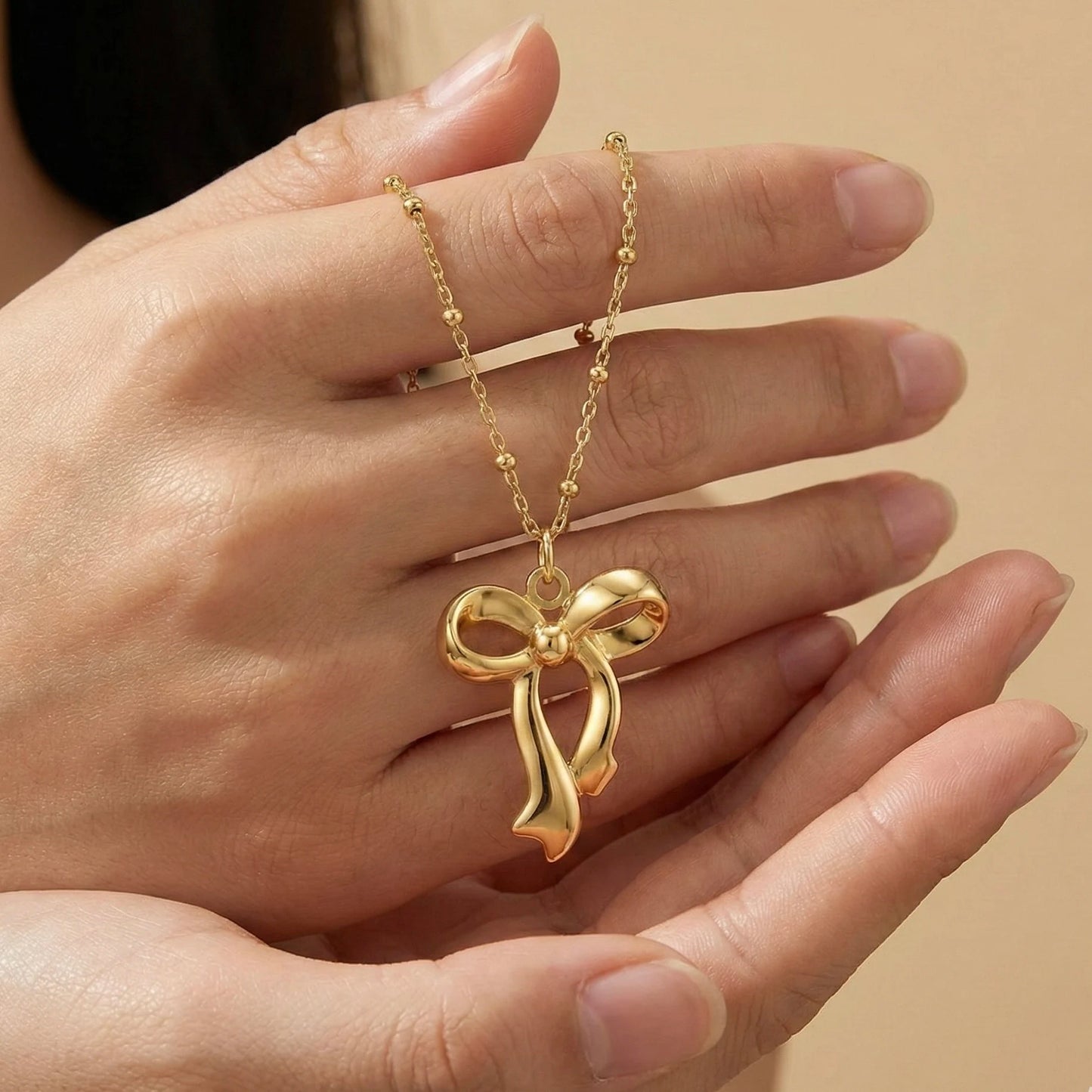 18KT Gold Plated Delicate Bow Romance Pendant