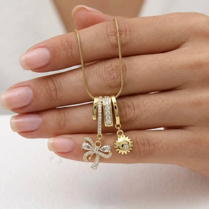 18Kt Gold Plated Bow & Sun Charm Pendant Necklace